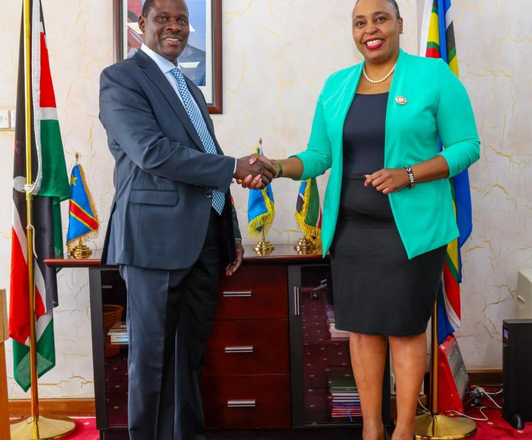 PS Wagunda and PS Karugu shake hands